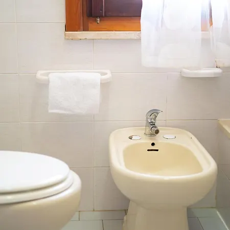 Apartman Capo Comino 1 La Caletta