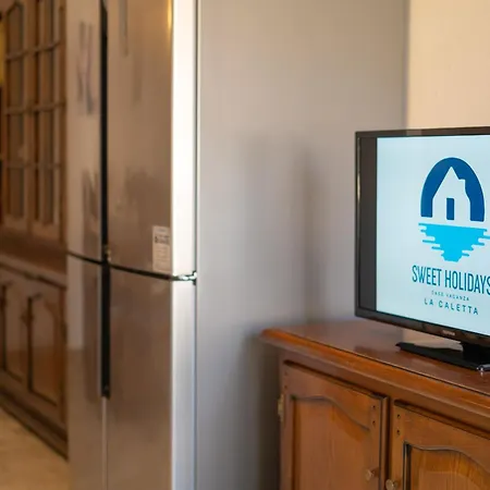 Capo Comino 1 Apartman La Caletta